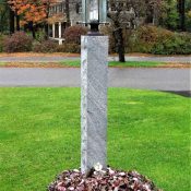 granite lamp post in front yard