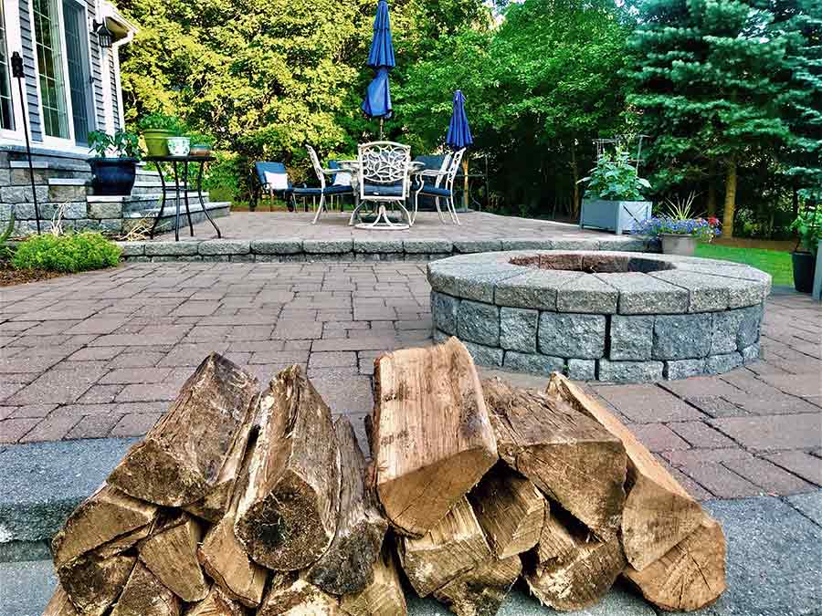 home back yard landscape paver patio and fire pit