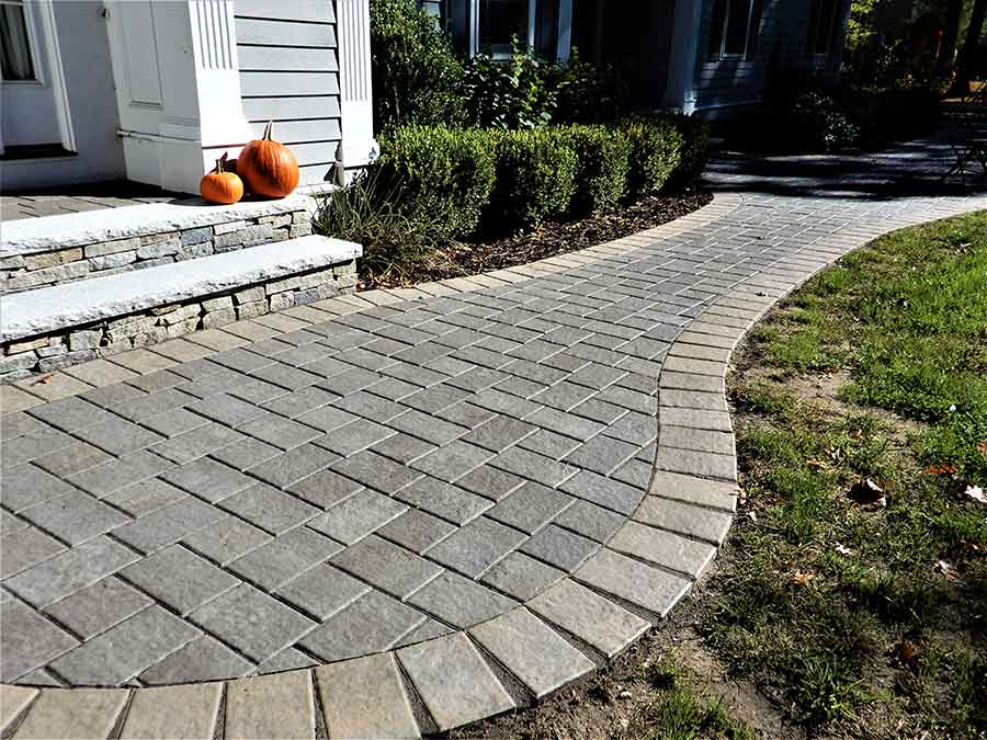front home paver walkway entrance and fieldstone steps with granite treads