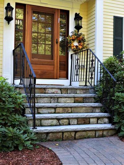 front entryway with natural stone steps, granite treads and paver walkway