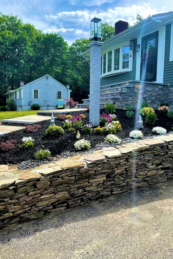 front entryway with natural stone steps, granite treads and paver walkway