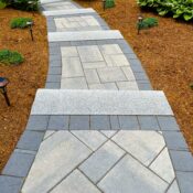 front walkway with granite tread and paver steps