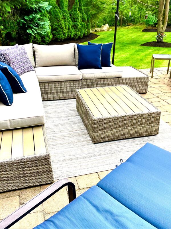 paver patio with furniture for outdoor relaxing and entertaining
