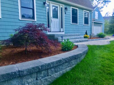 planting bed retaining wall and granite front steps