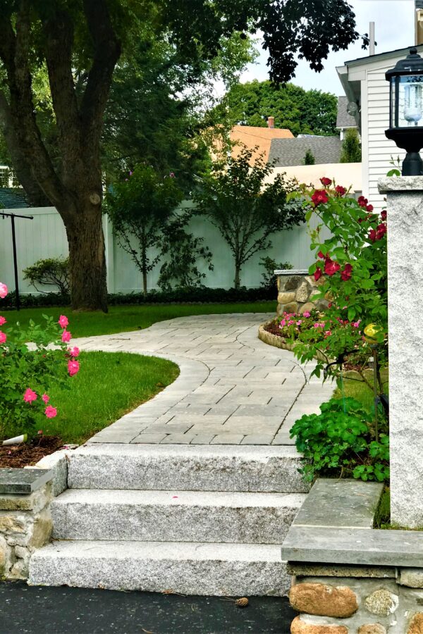 paver walkway with granite steps and lamp post