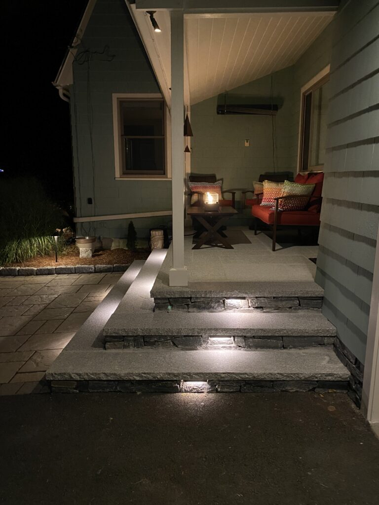 paver patio with fieldstone steps and granite treads