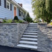 retaining wall with steps and granite treads