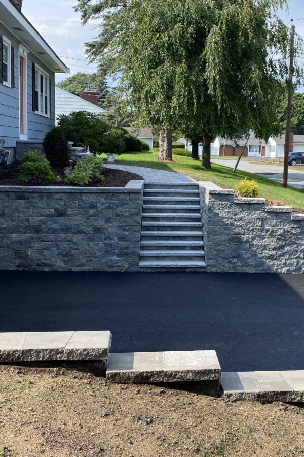 tiered stone retaining wall and steps