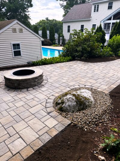 backyard paver patio with fire pit