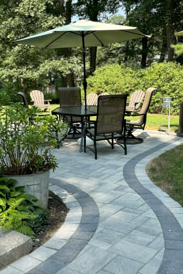 paver walkway and patio with black onyx border