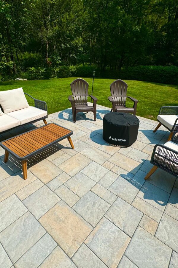 bluestone patio with fire pit and furniture