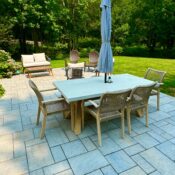 paver patio with table and chairs for entertaining