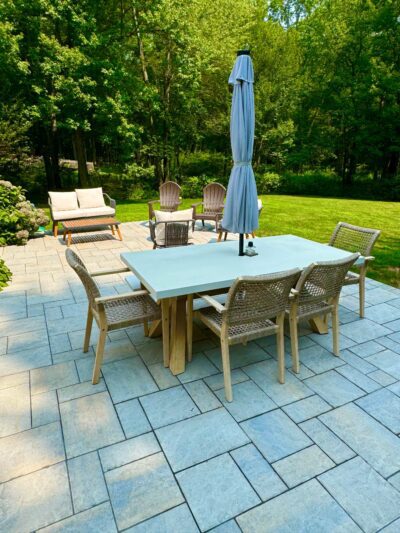 paver patio with table and chairs for entertaining