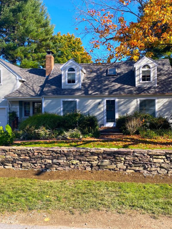 front yard veneer stone wall