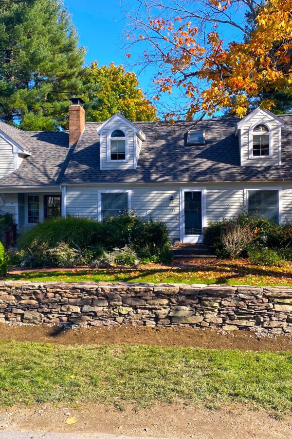 front yard veneer stone wall