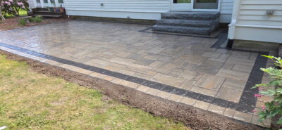 - Courtyard Concepts backyard paver patio and granite steps