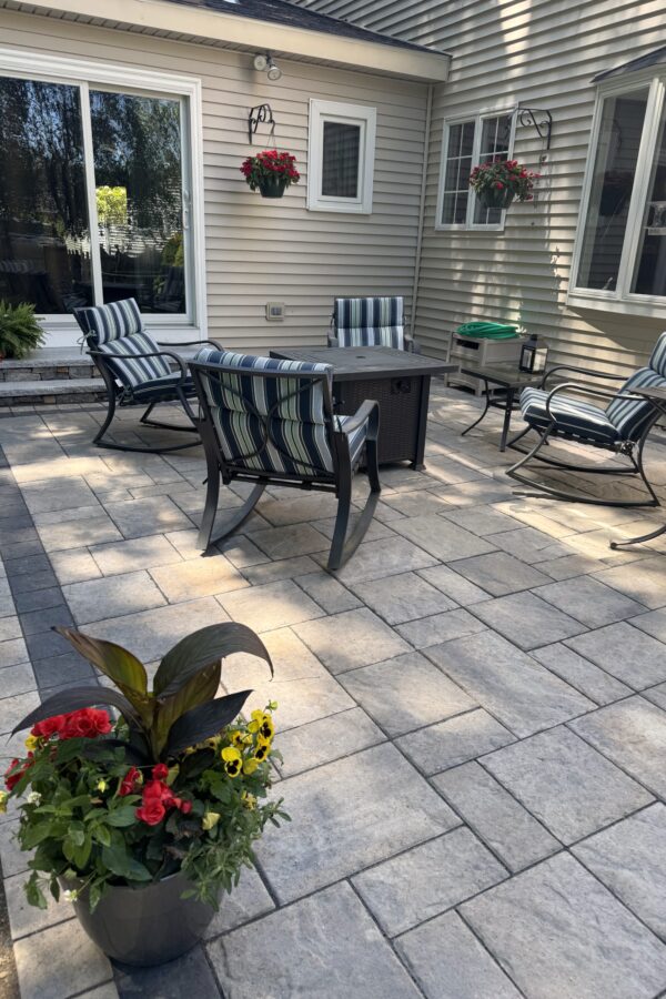 outdoor paver patio for entertaining with steps entryway